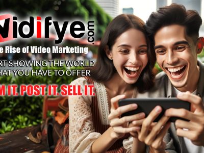 Happy couple smiling while viewing a Vidifye video ad on their smartphone.